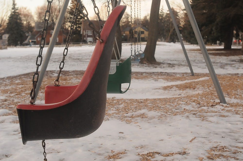 <p>Bailey Community Center playground sits empty Jan 30, 2015, 300 Bailey St East Lansing due to the recently announced closing of the building. State News file photo.&nbsp;</p>