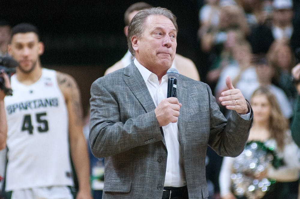 Head coach Tom Izzo addresses the crowd at the end of the home men's basketball game against Binghamton on Dec. 5, 2015 at the Breslin Center. Izzo encouraged the crowd to watch the Spartan football team in the Big Ten championship that night and to represent the university well with their actions. "Do whatever you want," he said. "Just don't burn any couches." 