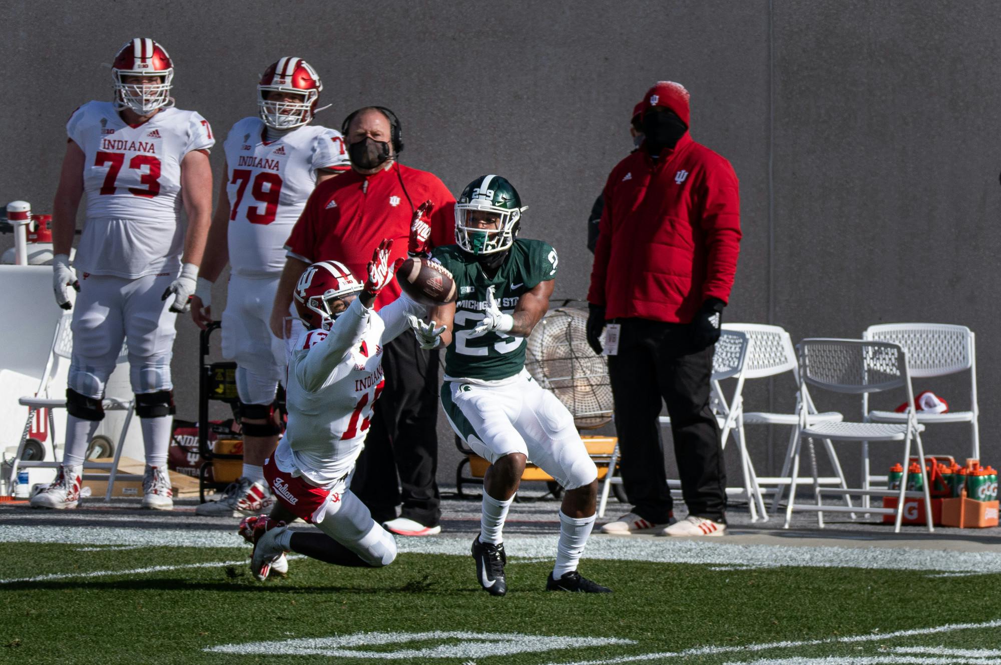 MSU cornerback, Shakur Brown (29), intercepts a Hoosier pass meant for Indiana wide receiver, Miles Marshal (13).