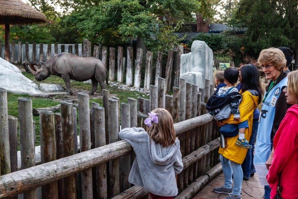 Docent Kate Wight leads a tour at the Potter Park Zoo Falconers Sundown Safari on Sept. 28, 2019.