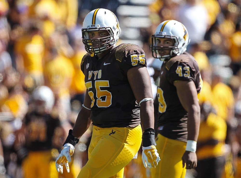 <p>Sep 20, 2014; Laramie, WY, USA; Wyoming Cowboys defensive end Eddie Yarbrough looks around during the game against the Florida Atlantic Owls on Sept. 20, 2014, at War Memorial Stadium in Laramie, Wyo. The Cowboys beat the Owls, 20-19. Photo courtesy of Troy Babbitt</p>