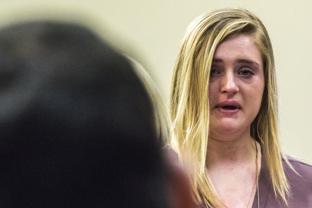 Madeline Johnson, 15, tears up as she addresses Ex-MSU and USA Gymnastics Dr. Larry Nassar on the fourth day of Nassar's sentencing on Jan. 19, 2018 at the Ingham County Circuit Court in Lansing. (Nic Antaya | The State News)