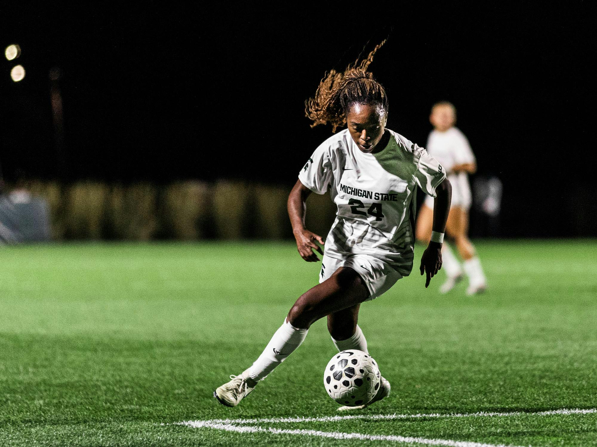 <p>MSU junior forward Kennedy Bell (24) drives the ball towards Notre Dame defense at DeMartin Soccer Complex in East Lansing, Michigan on Sept. 4, 2025.</p>