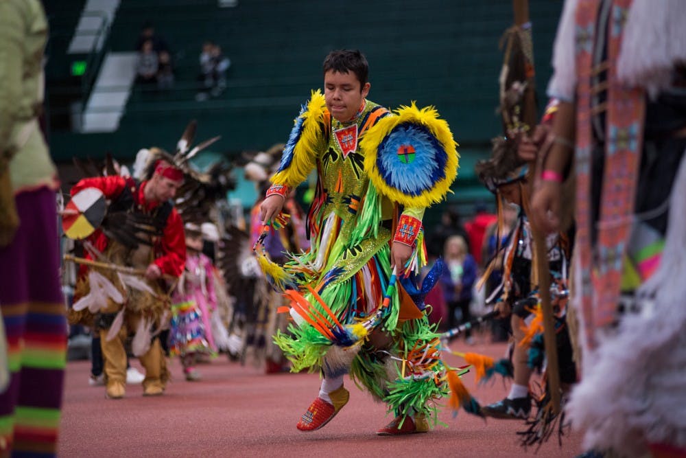 Ontario, Canada resident Liam Sands, 14, dances during a pow wow on April 9, 2016 at the Jenison Field House. This event was put on by North American Indigenous Student Organization which strives to promote education and motivate the Native Student Community at MSU.
