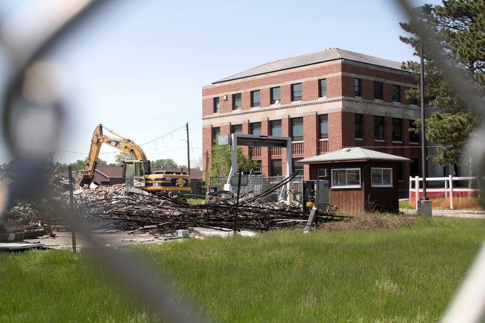 In early April, demolition began on the former Michigan State Police headquarters on Harrison Road. The headquarters was abandoned in 2010 to move to a new location at Grand River Avenue and Kalamazoo Street in downtown Lansing. Natalie Kolb/The State News