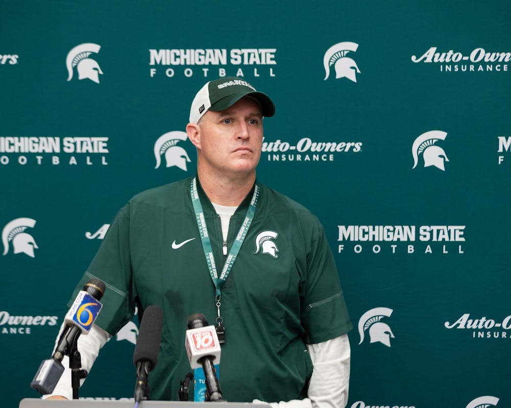 <p>Michigan State football HC, Pat Fitzgerald, answers questions during a press conference in the Skandalaris Football building in East Lansing, Mich., on Aug. 6, 2026.</p>