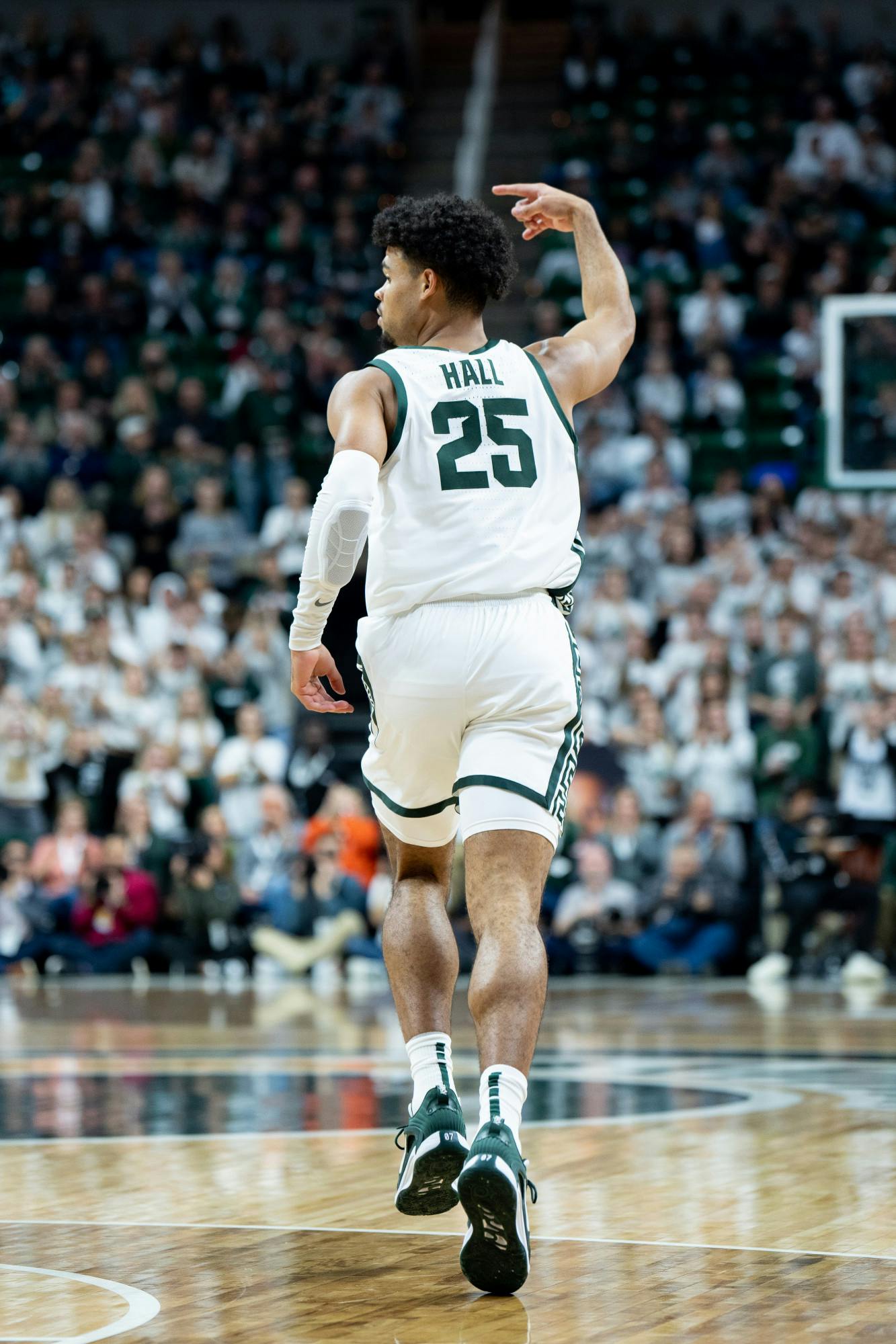 <p>Senior forward Malik Hall celebrates a three-pointer during the Spartans' 73-55 win over Northern Arizona on Nov. 7, 2022.</p>