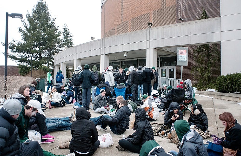 	<p>Students line up in the early afternoon in anticipation for the basketball game against the University of Michigan on Tuesday outside of Breslin Center. The tip-off will be at 9 p.m.</p>