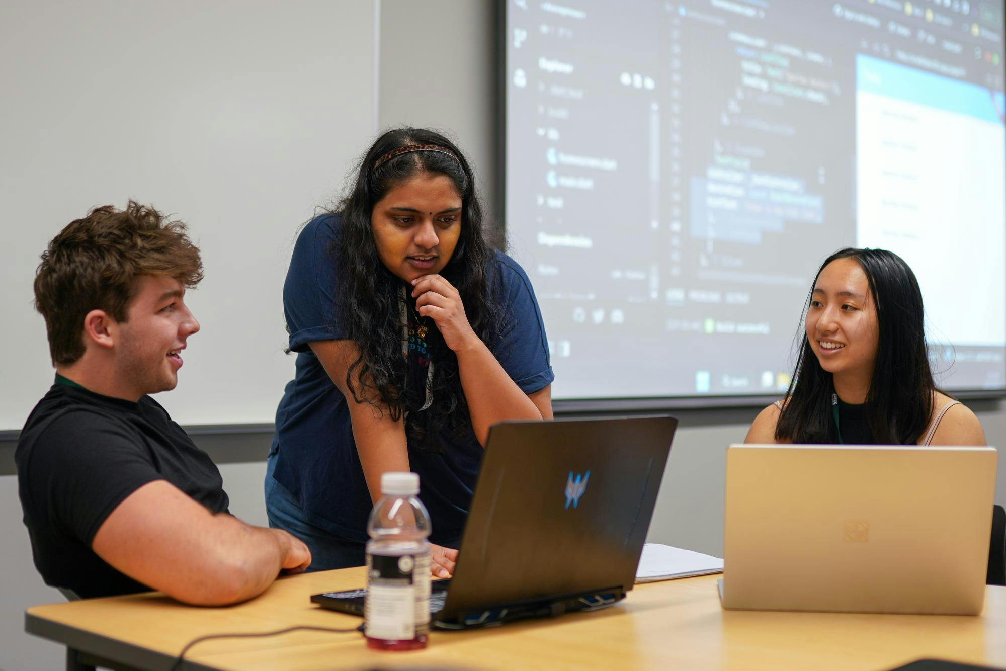 <p>Students helping other students practice coding during the Spartan Hackers workshop at Wonders Hall on Oct. 5, 2023.</p>