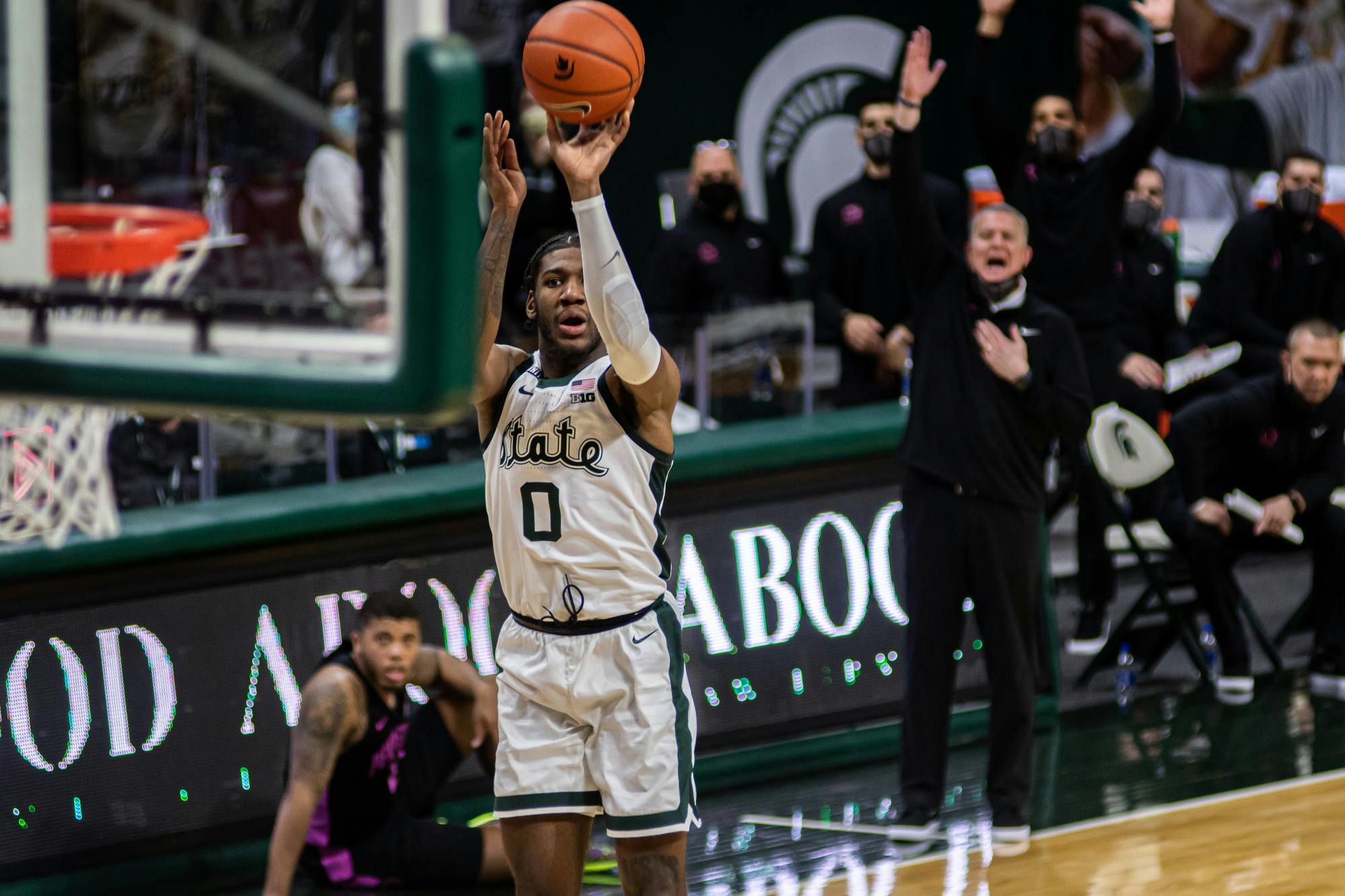 <p>Then-junior forward Aaron Henry puts up a mid-range shot. Henry&#x27;s 20 point night helped the Spartans&#x27; win against Penn State on Feb. 9, 2021.</p>