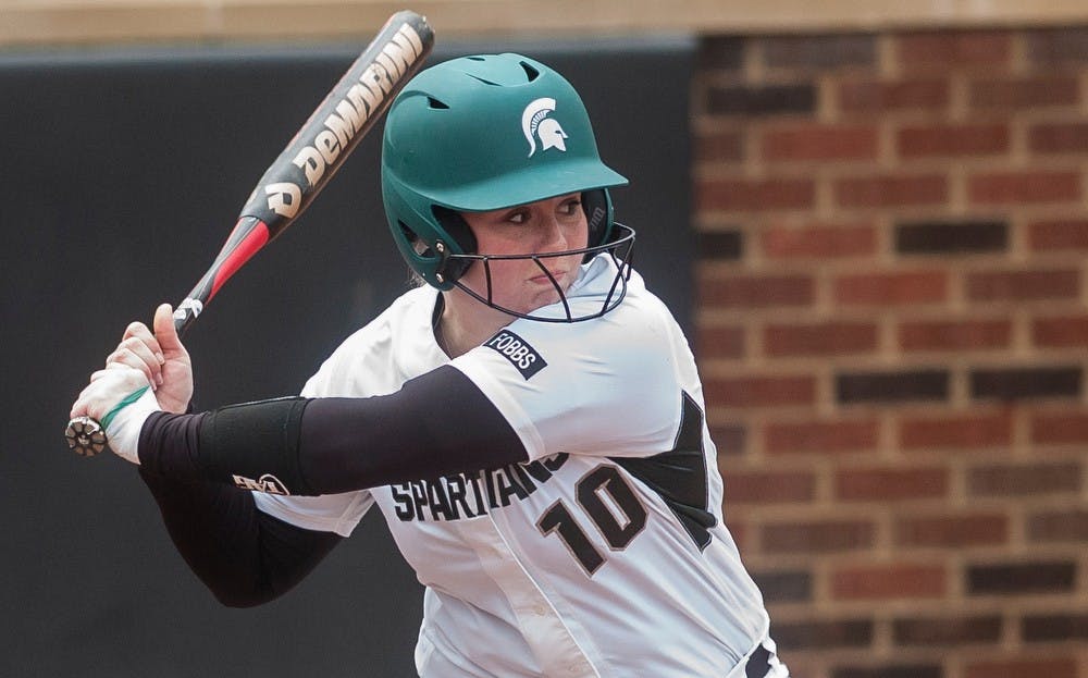 <p>Freshman outfielder Kassidy Kujawa looks to hit the ball April 4, 2014, during a game against Penn State at Secchia Stadium at Old College Field. The Spartans lost to the Nittany Lions, 9-3. Erin Hampton/The State News</p>
