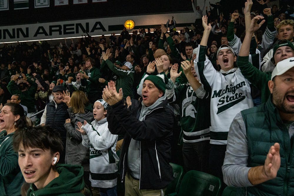 <p>MSU Fans Cheer during the Michigan State University verses Wisconsin Hockey game at MSU's Munn Stadium in East Lansing, Mich. on Saturday, Nov. 22, 2025.</p>