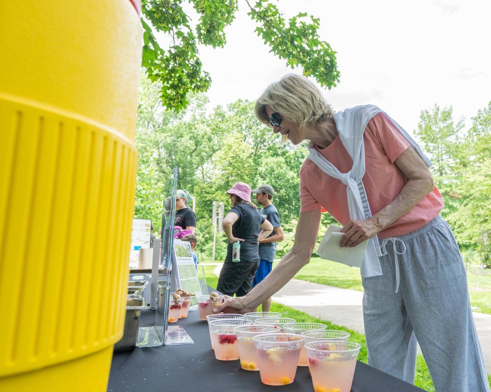 <p>Eat at State sets out drinks for attendees of the Music and the Garden event in East Lansing, Mich., on June 28, 2026.</p>