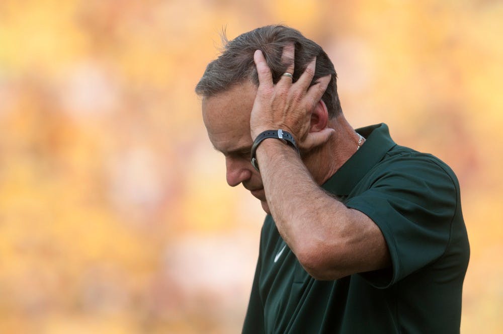 <p>Head coach Mark Dantonio reacts to the fourth quarter of the game against Oregon on Sept. 6, 2014, at Autzen Stadium in Eugene, Ore. The Spartans lost to the Ducks, 46-27. Julia Nagy/The State News</p>
