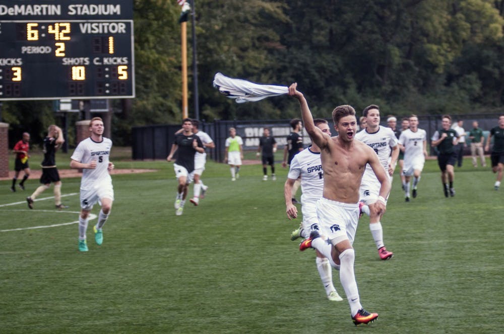 Sophomore forward Ryan Sierakowski (11) celebrates after scoring the game-winning goal against Western Michigan University on Oct. 5, 2016 at DeMartin Stadium at Old College Field. The Spartans defeated the Broncos 2-1 in overtime, with Sierakowski netting both Spartan goals. 