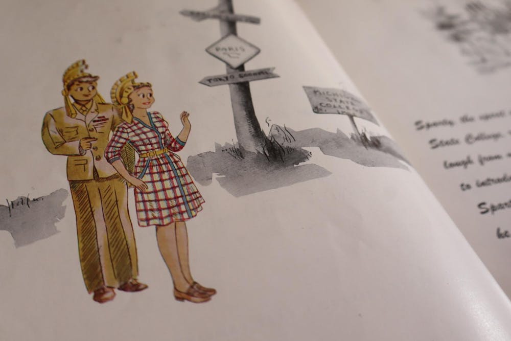 <p>Sparty shows Spartina the way to campus on the second page of the 1945 Wolverine yearbook.</p>