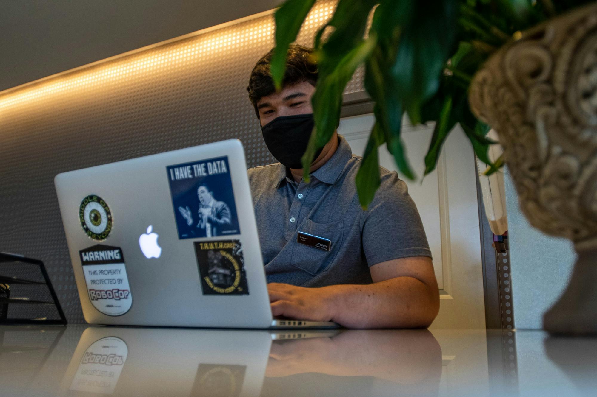 <p>English senior Johnny Mocny studies on his computer during a break at work on Sept. 2, 2020.</p>