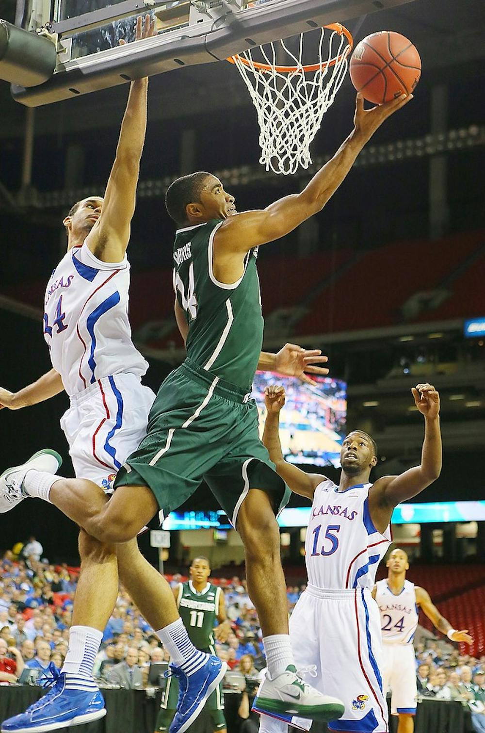 	<p>Michigan State&#8217;s Gary Harris lays up two points from under the basket during first-half action in the State Farm Champions Classic Tuesday night. Curtis Compton/Atlanta Journal-Constitution/MCT</p>