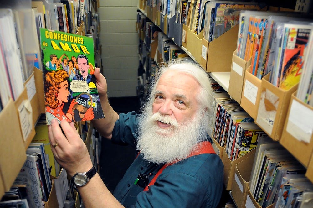 	<p>Comic art bibliographer Randy Scott poses for a photo March 28, 2013 at the Main Library. The Main Library is home to the largest library collection of comic books in the world. Katie Stiefel/The State News</p>