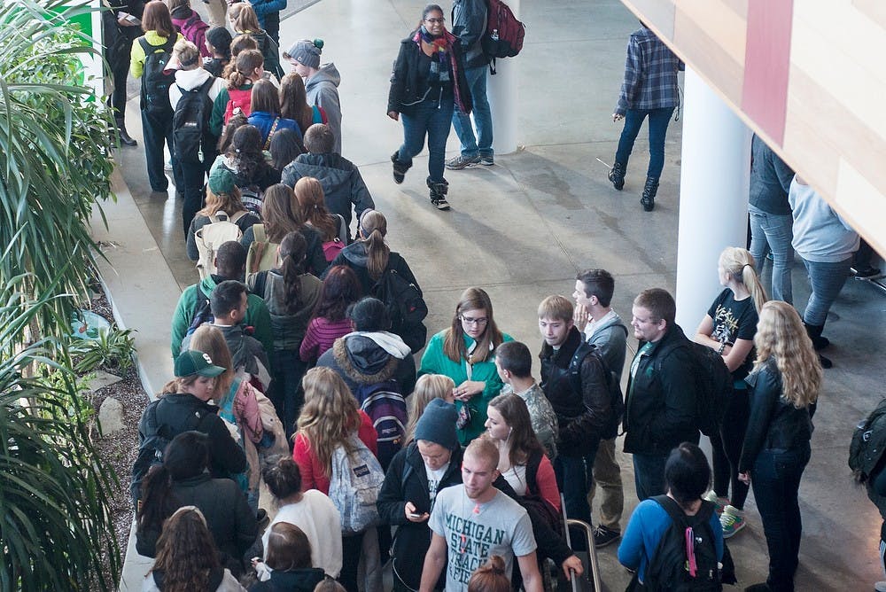 	<p>Students wait in line for early release tickets to &#8220;The Hunger Games: Catching Fire&#8221; on Nov. 19. 2013, at Brody Complex. College ambassadors from the Cross Cultural Marketing Group gave away 392 tickets for an advanced screening at <span class="caps">NCG</span> Eastwood Cinemas. Margaux Forster/The State News</p>