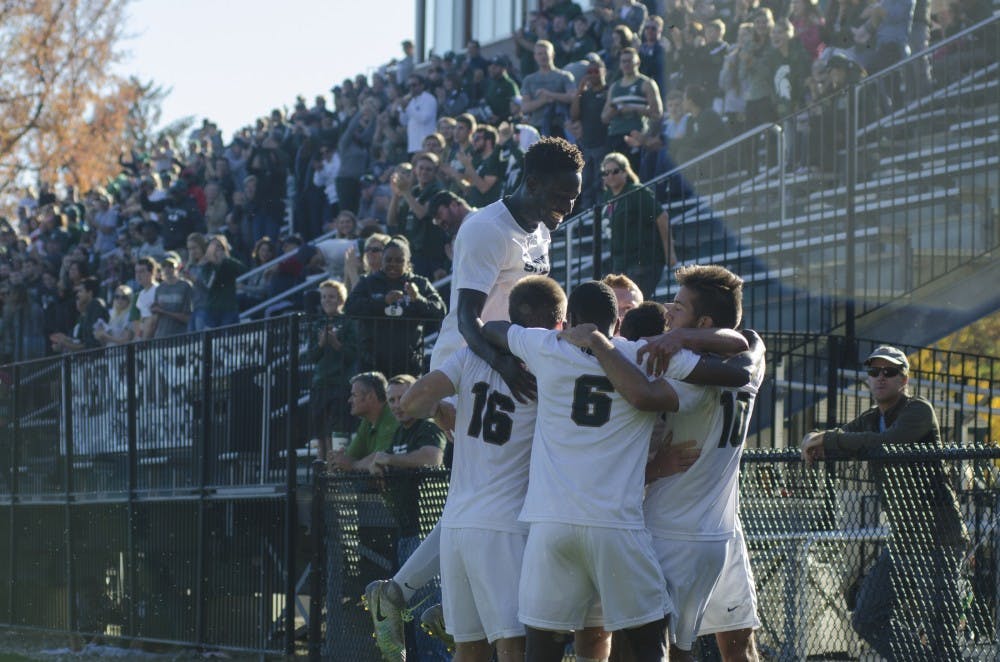 The Spartans celebrate a goal on Nov. 6, 2016 in DeMartin Stadium. The Spartans defeated the Nittany Lions, 2-1.