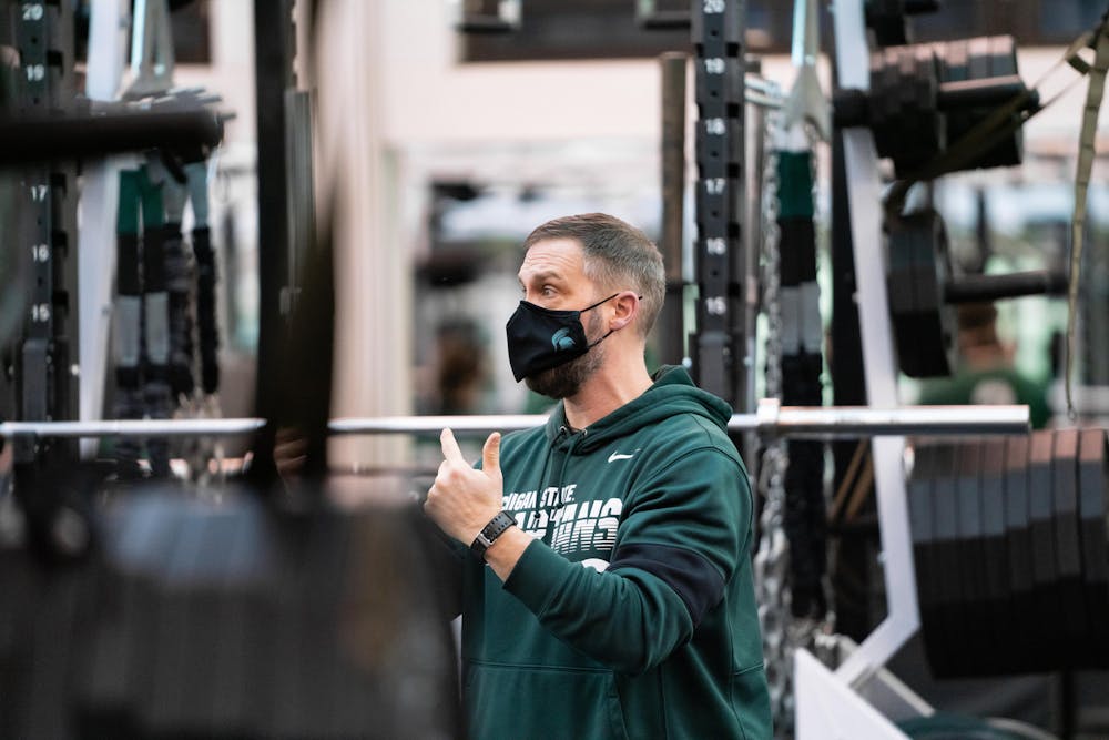 <p>MSU football&#x27;s head strength and conditioning coach, Jason Novak, leads a workout during the program&#x27;s winter off-season weight lifting program. </p>