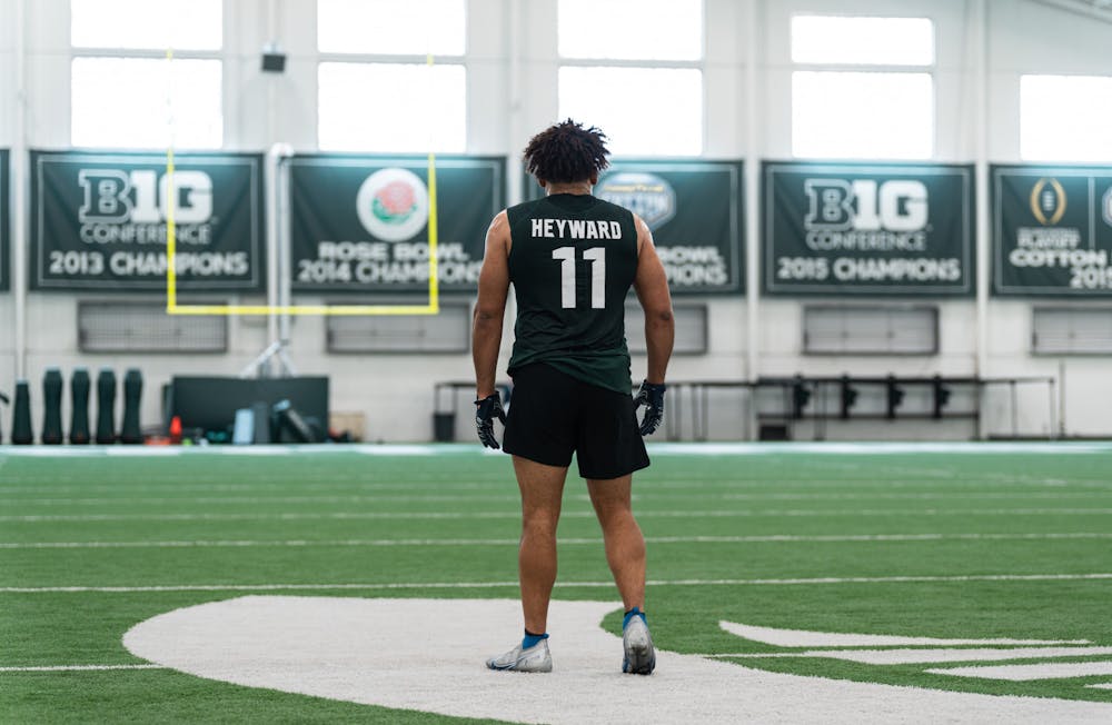 <p>Michigan State redshirt senior Connor Heyward getting ready to run his routes for Pro Day on-field position drills, on Mar. 16, 2022 at the Duffy Daugherty Indoor Football Building.</p>