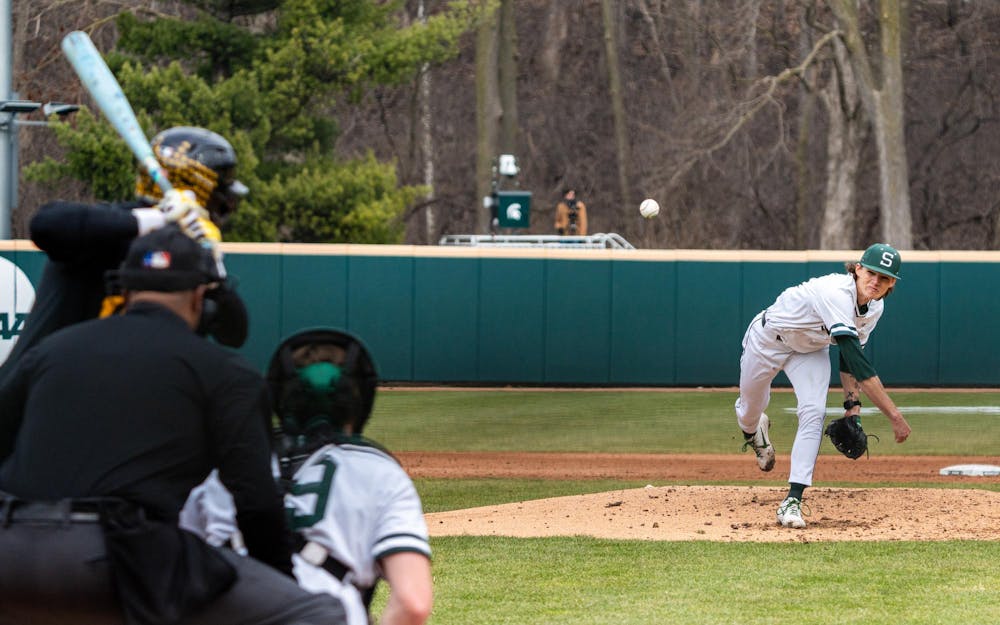MSU Gr. RHP, Carter Monke (7), throws a pitch towards home plate in game 2 of their series with Iowa in the Jeff Ishbia Field in McLane Stadium in East Lansing, MI on March 21, 2026.