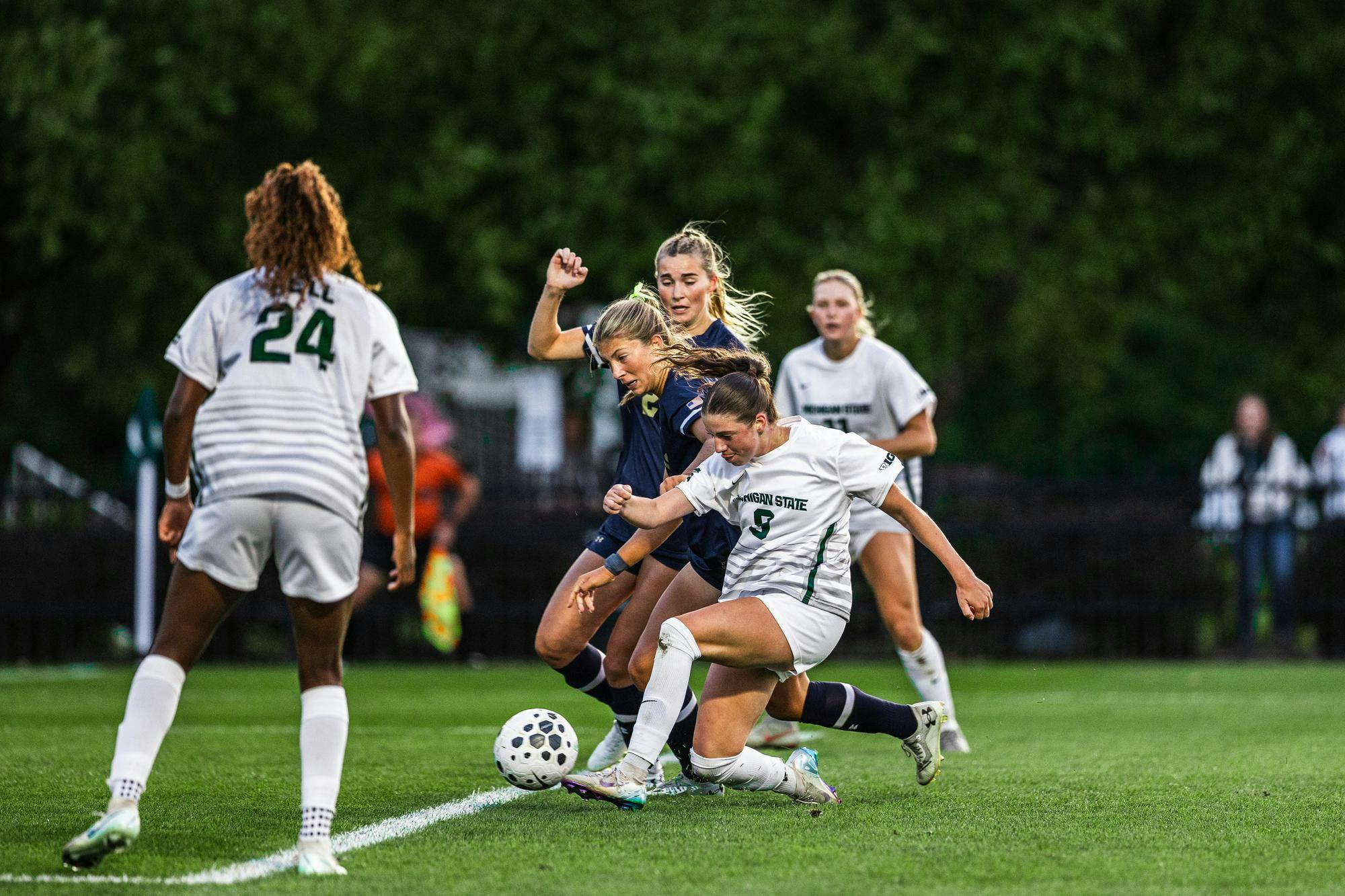 <p>Michigan State junior midfield Kayla Briggs (9) pushes the ball upfield against Notre Dame at DeMartin Stadium in East Lansing, Michigan on Sept. 4, 2025.</p>