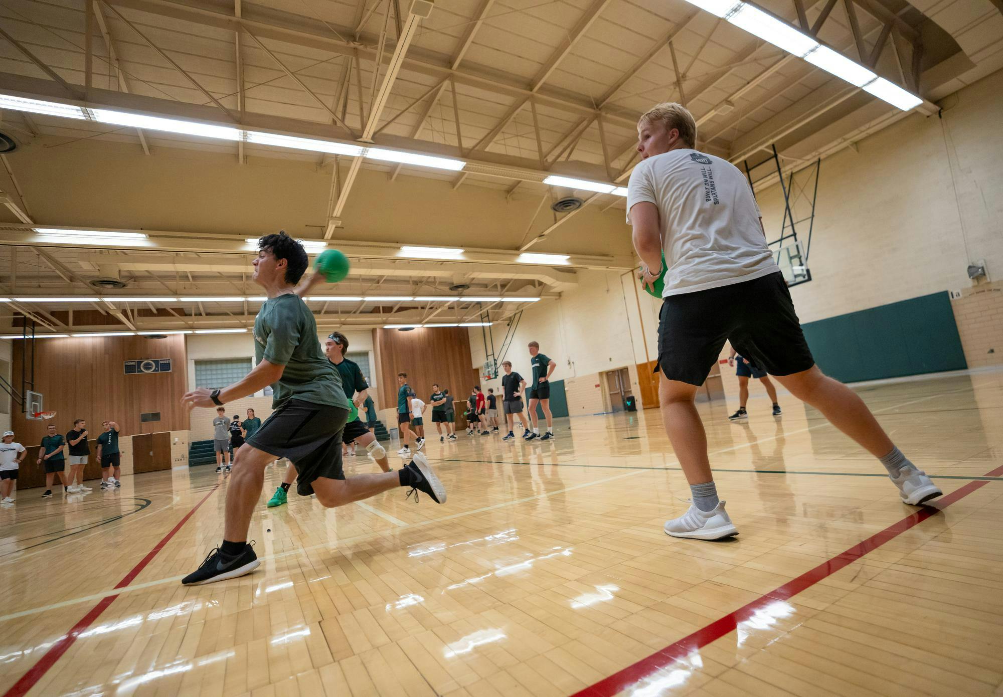 MSU club dodgeball players throw the ball during their practice in IM Circle on Sept. 10, 2024. The team won the National Collegiate Dodgeball Association National Championship in 2023 and 2024.