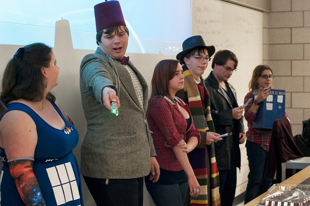 	<p>Chemical engineering freshman Chase Curtin poses as the Eleventh Doctor during a cosplay costume contest Oct. 28, 2013, in The Biomedical and Physical Sciences Building. The &#8220;Doctor Who&#8221; fan club got together in costume for a Halloween party and watched episodes of the show. Margaux Forster/The State News</p>