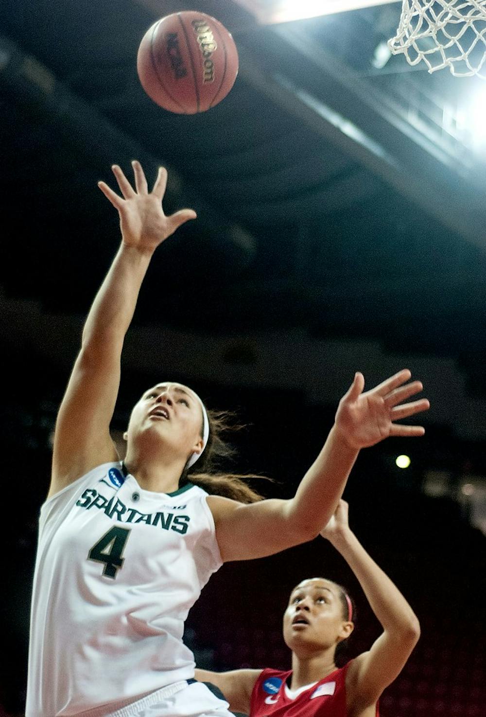 	<p>Sophomore center Jasmine Hines shoots during the first round of the <span class="caps">NCAA</span> Tournament on Saturday, March 23, 2013, against Marist at Comcast center in College Park, Maryland. The Spartans defeated the Red Foxes, 55-47. Julia Nagy/The State News</p>