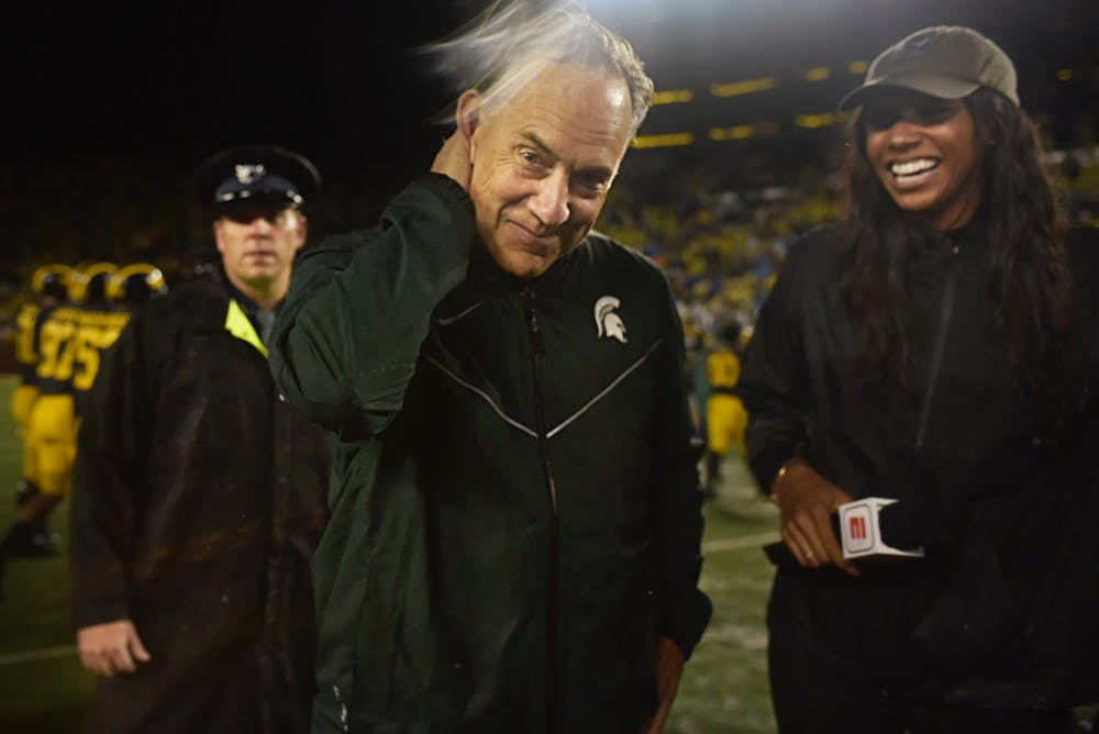 Head Coach Mark Dantonio smiles before doing an interview after the game against Michigan on Oct. 7, 2017 at Michigan Stadium. The Spartans defeated the Wolverines, 14-10. 