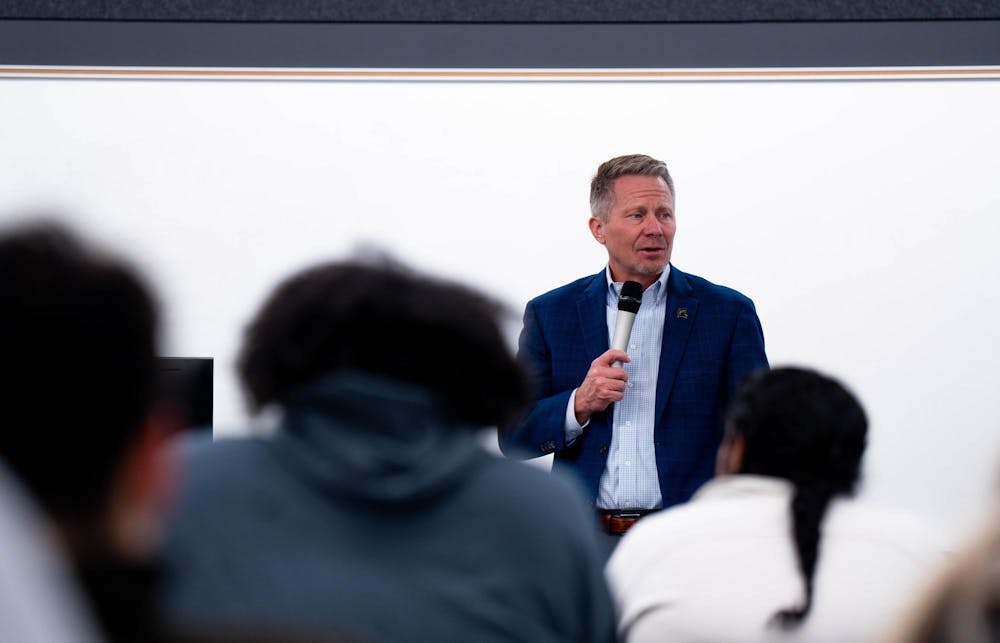 MSU president Kevin Guskiewicz addresses the general assembly during the ASMSU meeting at MSU International Center, in East Lansing, on Dec. 4th, 2025.