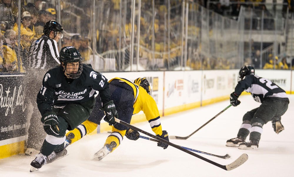 <p>Michigan State freshman forward Anthony Romani (21) skates away after the University of Michigan took the puck at the Yost Ice Arena in Ann Arbor, Mich. on Dec. 6, 2025.</p>