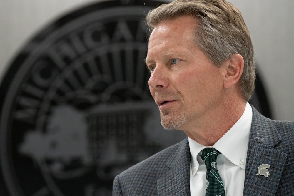 Michigan State University President Kevin Guskiewicz answers media questions after the Oct. 25, 2024 Board of Trustees meeting at the Hannah Administration building.