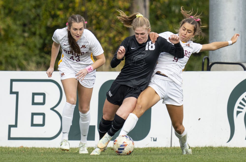 <p>Junior midfielder Justina Gaynor, 18, fights for possession over Minnesota during Michigan State’s game against the Golden Gophers in the quarterfinals of the B1G Championships on Sunday, Oct. 30 at DeMartin Stadium. The MSU ultimately beat the Minnesota, 2-1.</p>