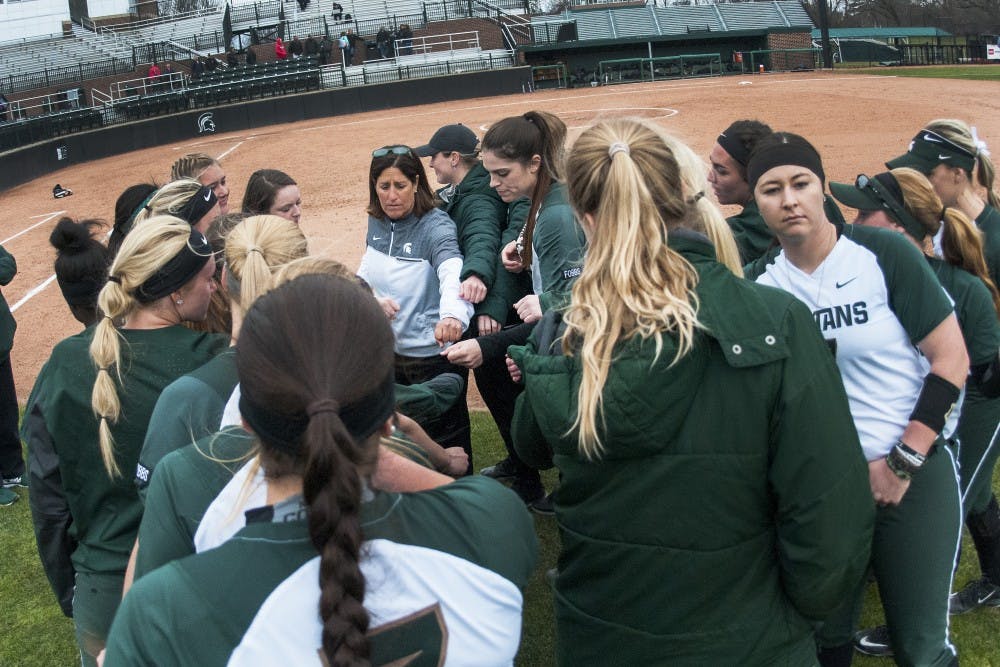 The Spartans huddle after the game against Western Michigan on March 29, 2017 at Secchia Stadium. The Spartans defeated the Broncos, 7-2.