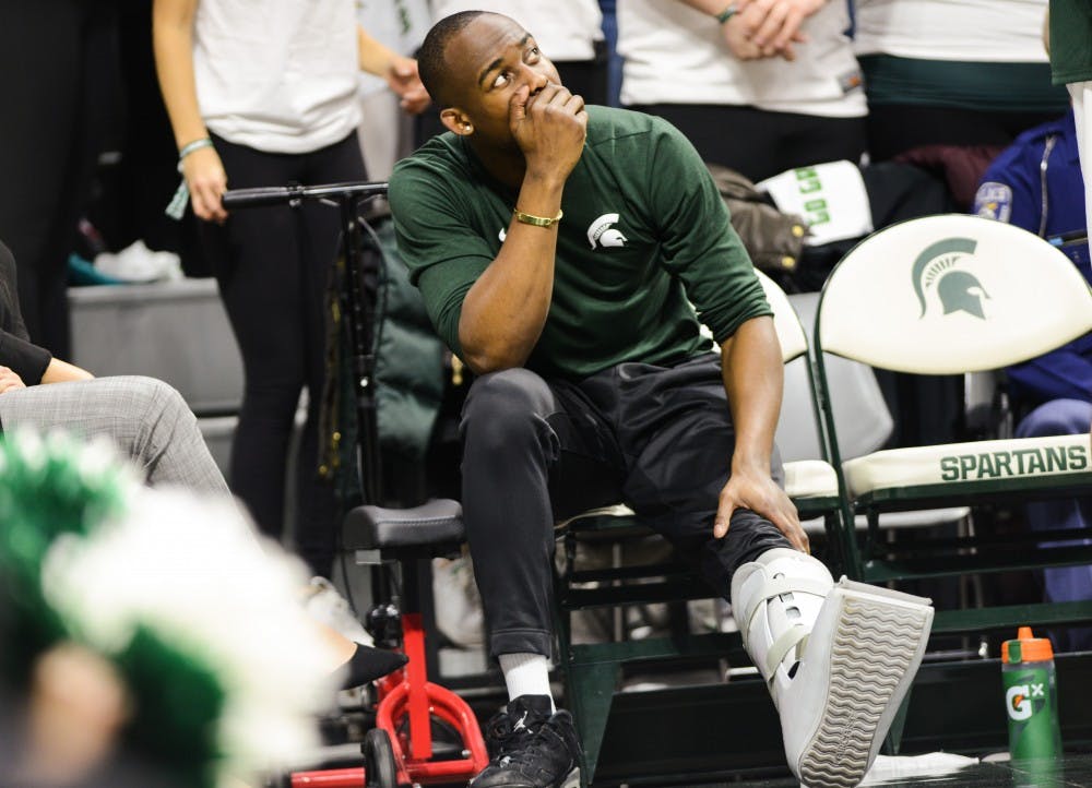 <p>Joshua Langford (1) watches his teammates on the court during the game against Michigan on March 9, 2019, at the Breslin Center. The Spartans defeated the Wolverines, 75-63.</p>