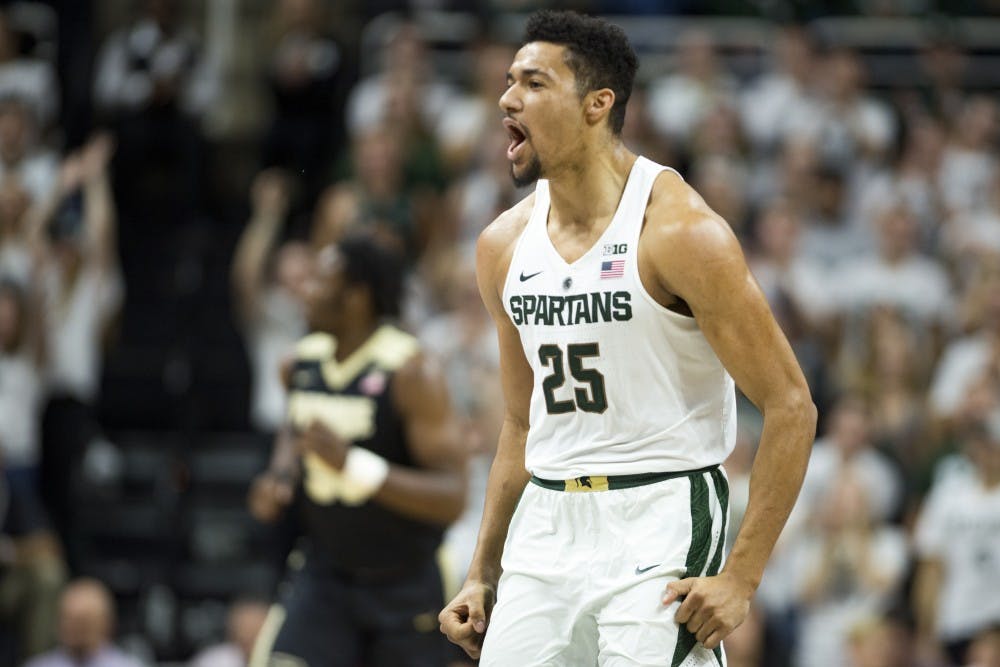 Sophomore forward Kenny Goins (25) expresses emotion after scoring during the first half of the men's basketball game against Purdue on Jan. 24, 2017 at Breslin Center. The Spartans were defeated by the Boilermakers, 84-73.