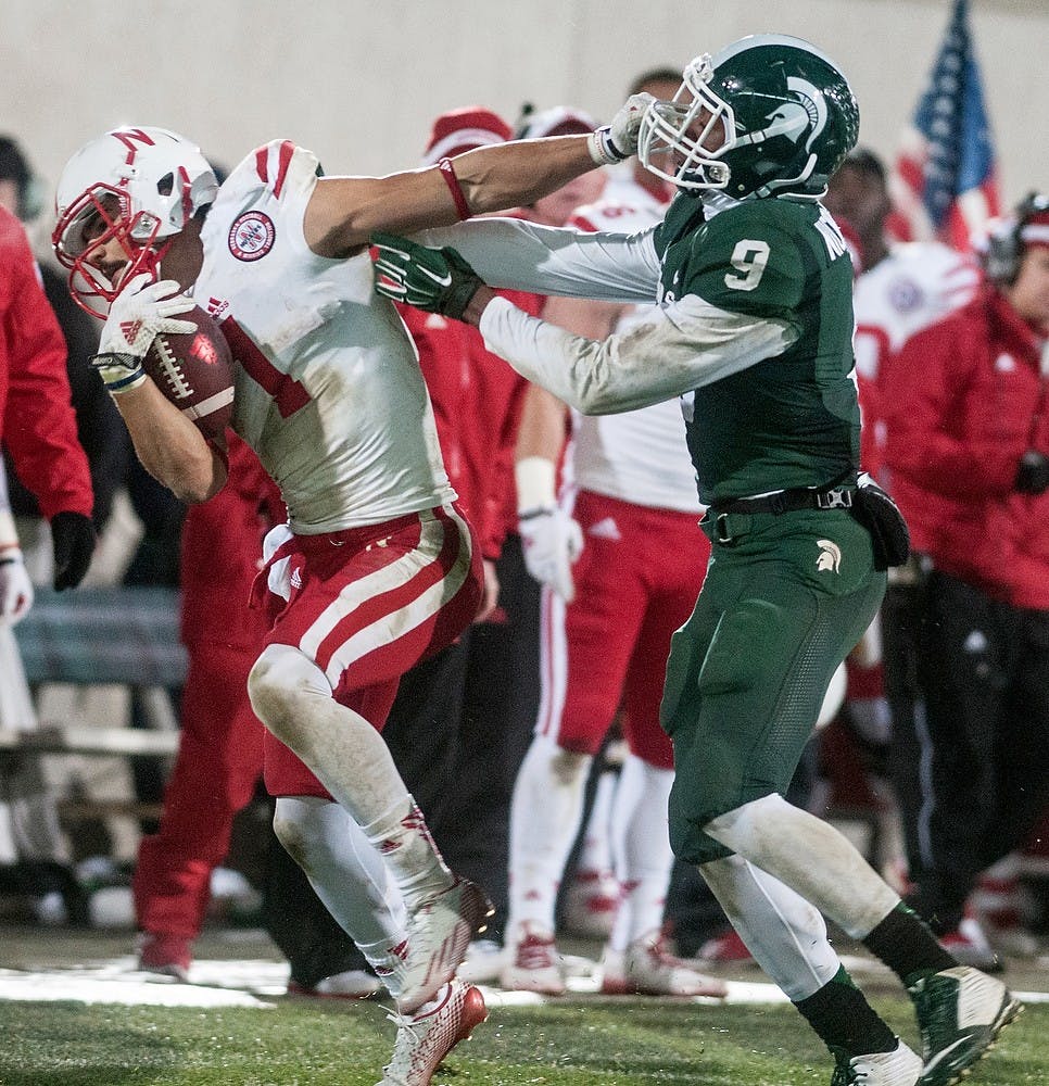 <p>Then-freshmen defensive back Montae Nicholson tackles then-Nebraska wide receiver Jordan Westerkamp Oct. 4, 2014, at Spartan Stadium. The Spartans defeated the Cornhuskers, 27-22. State News File Photo</p>