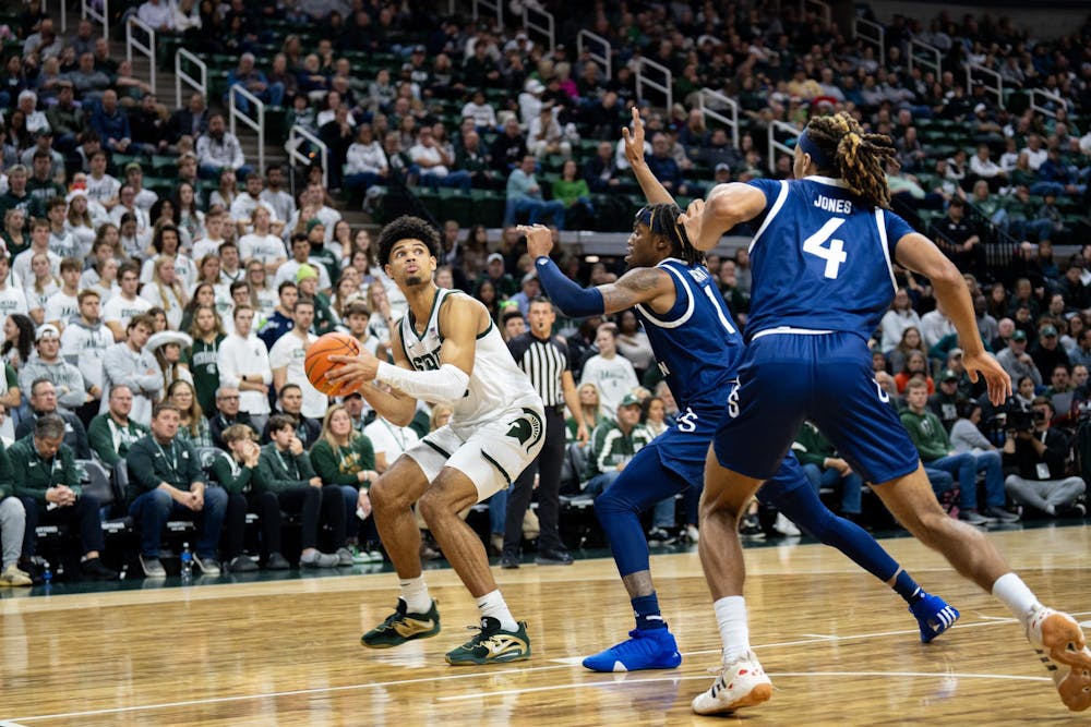 <p>MSU Graduate Student Forward Malik Hall (25) hounded by Georgia Southern defense during their game at the Jack Breslin Student Events Center, on Nov. 28, 2023.</p>