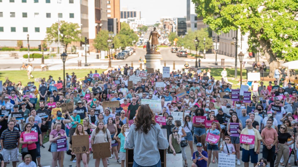 <p>Gov. Gretchen Whitmer addresses abortion-rights protesters at the Michigan State Capitol on June 24, 2022. Abortion-rights protesters gathered on the Michigan State Capitol lawn after the Supreme Court overturned the constitutional right to an abortion, decided by Roe v. Wade in 1973, through their decision in the Dobbs vs. Jackson Women&#x27;s Health Organization case.</p><p></p>