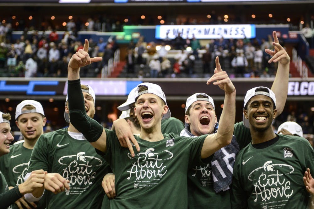 <p>The Spartans celebrate after the game against Duke on March 31, 2019 at Capital One Arena. The Spartans defeated the Blue Devils, 68-67. The Spartans are the East Regional Winners and are headed to the Final Four.</p>