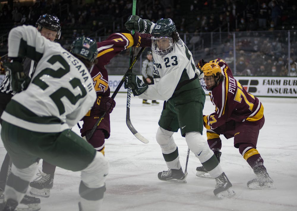 <p>Spartans junior forward Jagger Joshua enters the face off against Minnesota in the Spartans&#x27; match against the Golden Gophers at Munn Ice Arena on Friday, Jan. 7, 2022. </p>