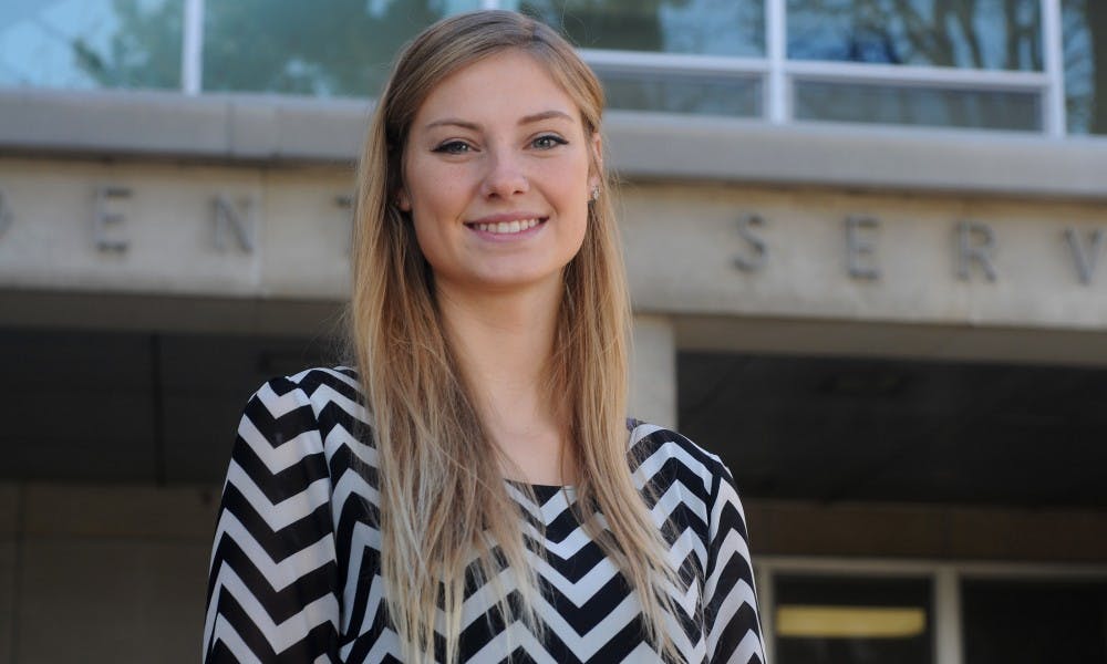 Psychology and criminal justice senior Kara England poses for a portrait on Nov. 16, 2015 outside of the Student Services building. She is a volunteer for the Sexual Assault Crisis Intervention Program at MSU and does everything from running social media for outreach purposes to volunteering with the 24 hour sexual assault hotline. 