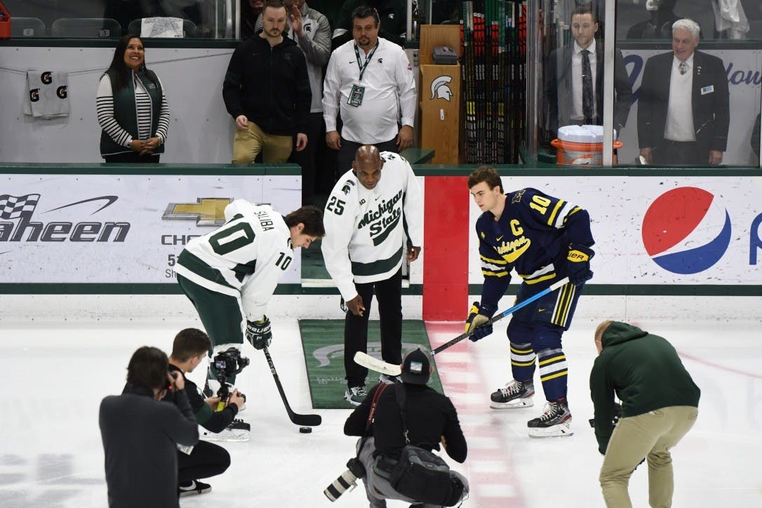 MSU head football coach Mel Tucker drops the puck before the game against Michigan on Feb. 14, 2020 at the Munn Ice Arena. MSU fell to U of M 5-1.