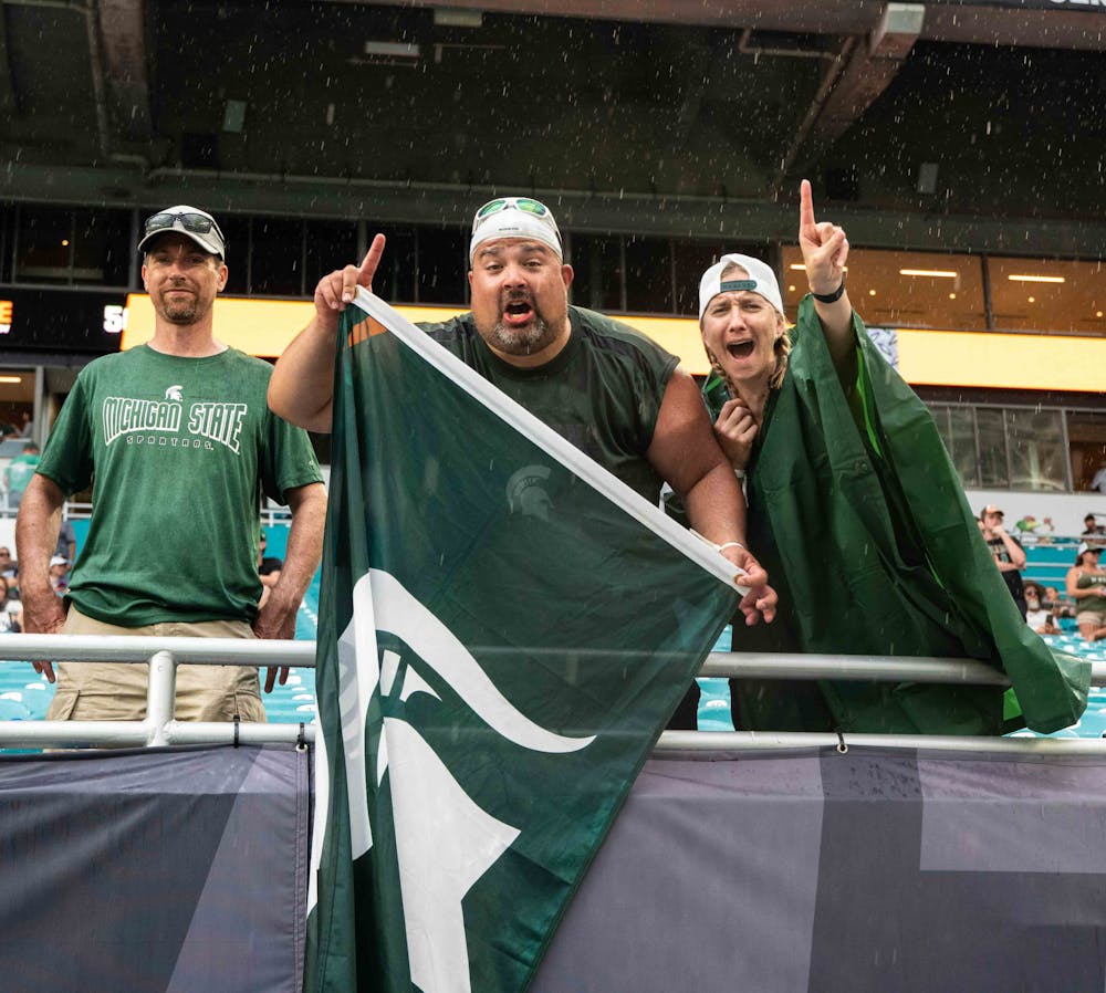 <p>Heavy rain started to come down in Hard Rock Stadium but was no match for faithful Michigan State fans. The Spartans beat the Hurricanes 38-17 at Hard Rock Stadium on Sept. 18, 2021.</p>