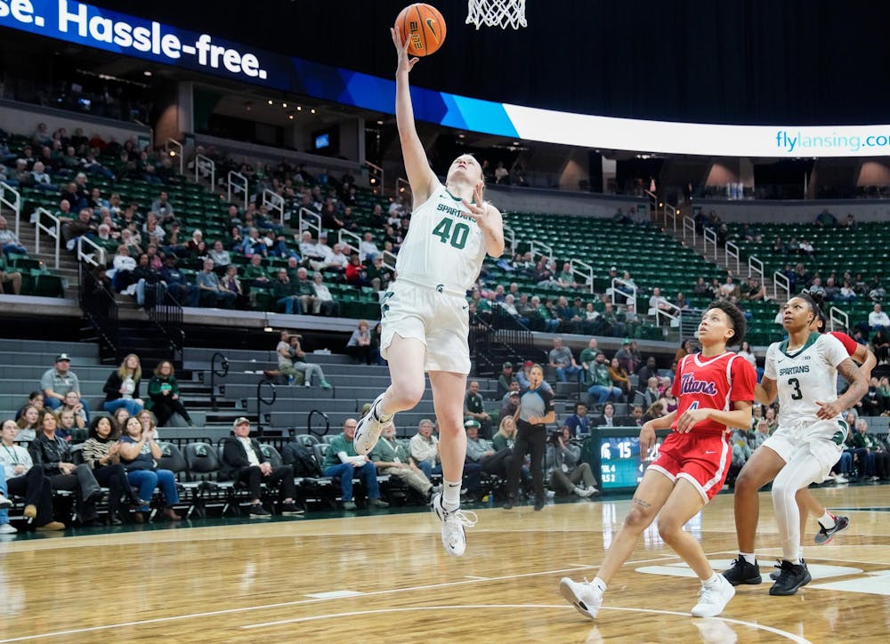 <p>Graduate student guard Julia Ayrault (40) makes a layup against the University of Detroit Mercy at the Breslin Center on Nov. 16, 2023.</p>