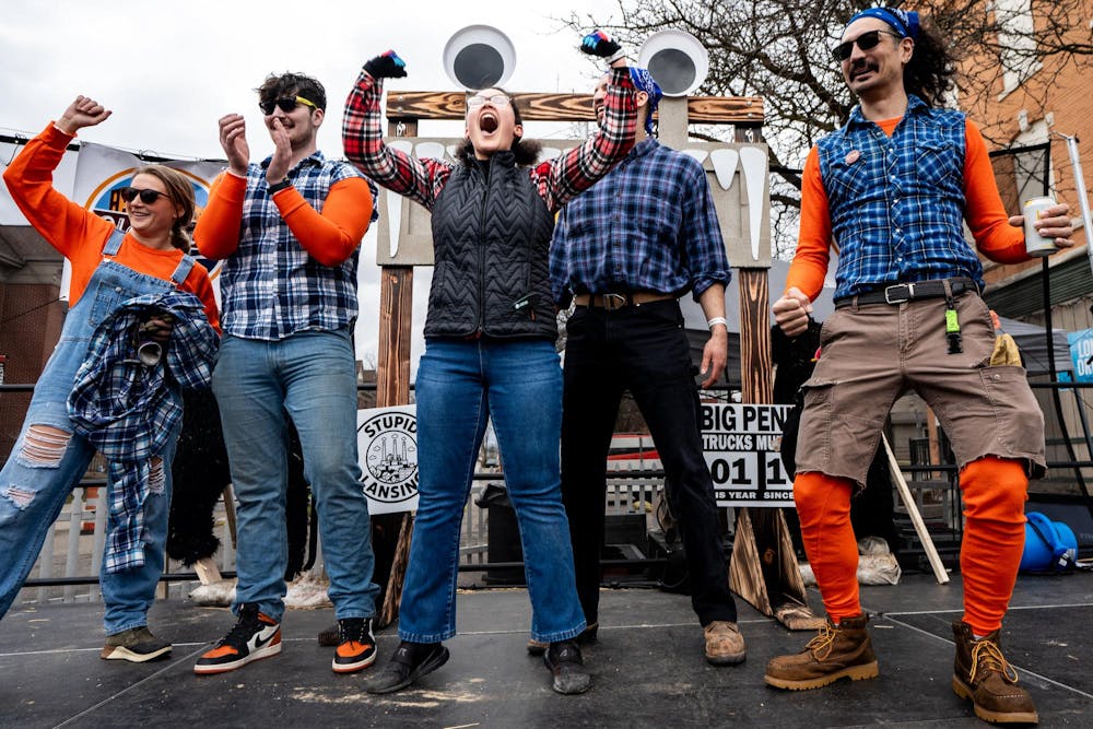 Team Oak and Smoke wins the feats of strength competition during the annual Brrs, Beards & Brews: A Lumberjack Festival in Old Town Lansing, Mich., on Saturday, March 7, 2026.